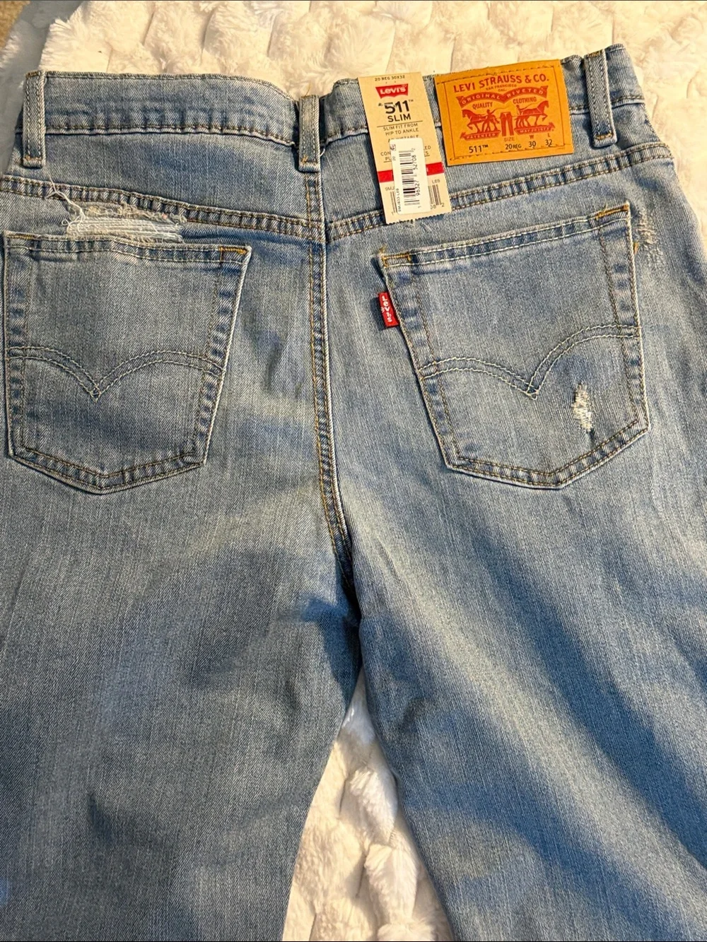 Levi's Light Blue Slim Fit Ripped Jeans
